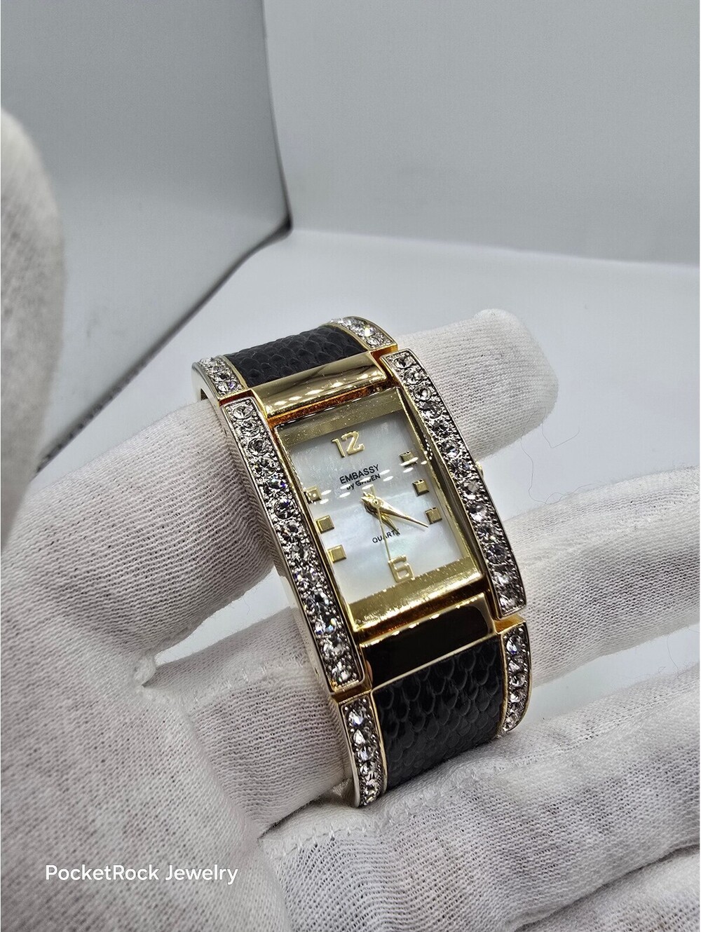 Embassy by Gruen Women’s Quartz Rectangle Analog White Dial Gold Black Bangle